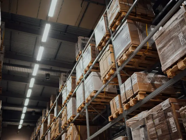 Shelving stacked with boxed spare parts in a logistics warehouse